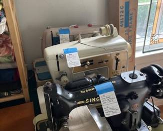 Selection of two sewing machines, vintage black Singer machine did sell.