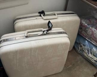 Vintage Samsonite suitcases, includes custom cloth covers.  Great condition