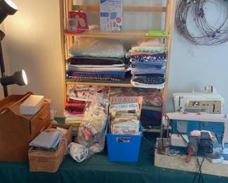 Fabric, three sewing machines and crafts