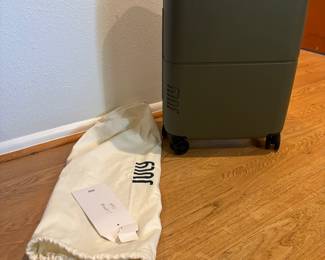 New, never used July rolling carry on: $50.00