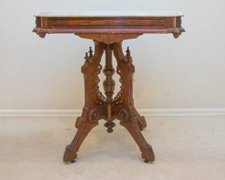 Antique Marble Top Lamp Table w/ornate woodwork (30.5"h x 29"w x 20.5"d):  $300.00