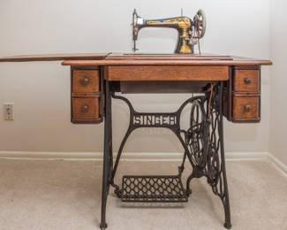 Antique Singer Sewing Machine in original oak and cast metal cabinet ~ Treadle-sphinx model # H390825:  $760.00