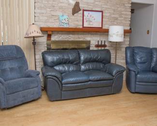 "Come get comfy!"  Left to right:  Lazyboy manuel recliner:  $80.00.  Blue leather love seat:  $120.00.  Blue leather swivel recliner:  $120.00