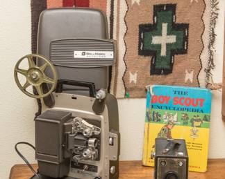 Bell & Howell Auto Load movie projector:  $68.00.  Ansco shut-shot box camera (1930's):  $20.00