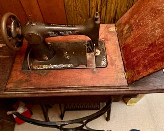 Antique Singer Sewing Machine in Wooden Cabinet