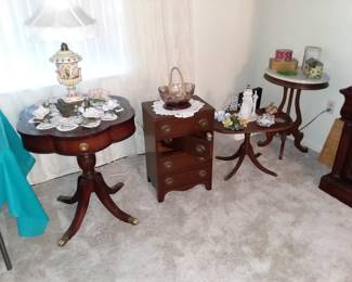 So cute sewing chest surrounded by other side tables