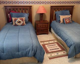 Upstairs Twin Room with bed, nightstand, lamp and tall dresser