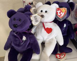 Beanie babies (lots of Purple Princess Di teddies)