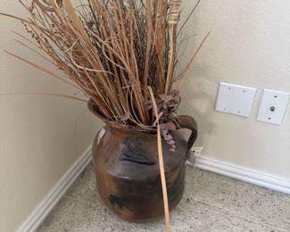 Large Pottery holding Dried grass