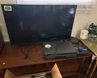Flat screen TV, VCR and DVD player