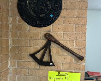 Plaster cast of Aztec Sun Stone (calendar stone) and antique African Songye Axe with snake skin covered handle. Axe is valued up to $400