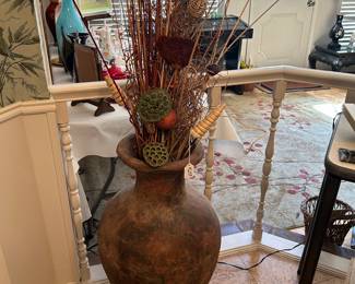 Large terra cotta vase with arrangement 