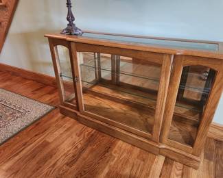 Oak lighted entry cabinet