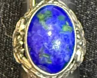 Oval Lapis Cabochon Mounted on Sterling With Floral Motif