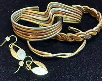 Mixed Metal Cuff Bracelets A Pair Of Earrings