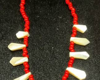 Mother of pearl graduated ray collar necklace with red micro bead spacer