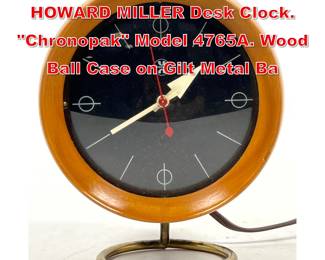 Lot 108 GEORGE NELSON for HOWARD MILLER Desk Clock. Chronopak Model 4765A. Wood Ball Case on Gilt Metal Ba