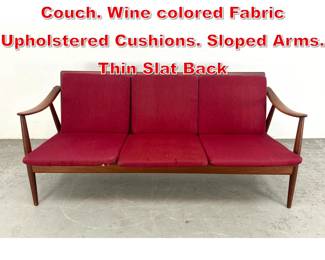 Lot 223 Teak Danish Modern Sofa Couch. Wine colored Fabric Upholstered Cushions. Sloped Arms. Thin Slat Back