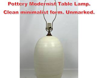 Lot 238 Ovoid Cream Glazed Pottery Modernist Table Lamp. Clean minimalist form. Unmarked. 