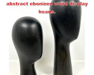 Lot 125 Pair of MidCentury Modern abstract ebonized wood display heads.