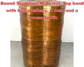 Lot 153 Artisan Copper Strap Bound Sculpture Pedestal. Top band with brass letters. A man and a woman findin