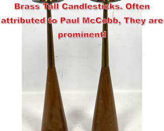 Lot 30 Mid Century Walnut and Brass Tall Candlesticks. Often attributed to Paul McCobb, They are prominentl