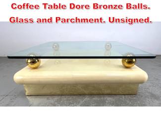 Lot 313 Karl Springer style Cocktail Coffee Table Dore Bronze Balls. Glass and Parchment. Unsigned.