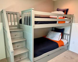 Twin over twin trundle bunk bed with storage stairs. Includes 3 mattresses