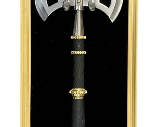 Decorative Double-Bladed Battle Axe In Shadow
