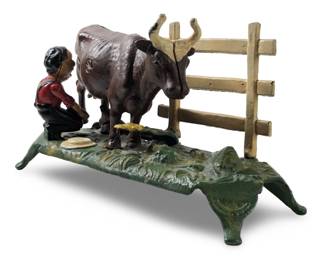 Kicking Cow The Book of Knowledge Cast Iron
