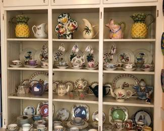 Kitchen Hutch Full of Teapots (Hall, Stadler), Bone China Tea Cups (Various Makers), Tea Plates, Sur la Table Pineapple Pitchers 