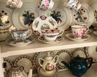 Close up of some Tea Cups, and Teapots