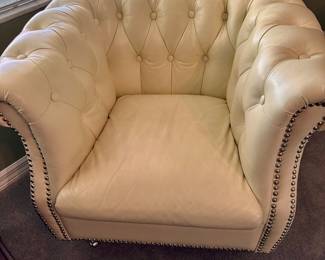 Leather chair on casters