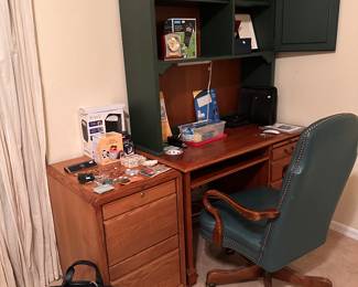 Desk and Shelving
Wooden File Cabinet 
Office Chair on Casters 
Brief case