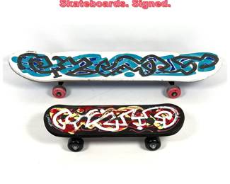 Lot 1206 2pcs Dennis Sakelson Decorated Skateboards. Signed.