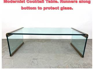 Lot 1473 After Pace Glass Brass Trim Modernist Cocktail Table. Runners along bottom to protect glass. 