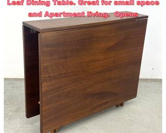 Lot 1496 Mid Century Modern Walnut Drop Leaf Dining Table. Great for small space and Apartment living. Opens