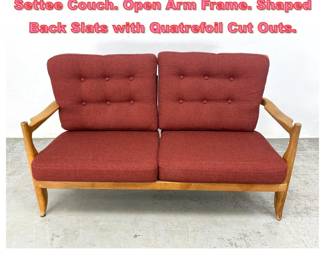 Lot 1613 GUILLERME et CHAMBRON Oak Settee Couch. Open Arm Frame. Shaped Back Slats with Quatrefoil Cut Outs. 