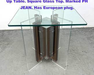 Lot 887 PHILIPPE JEAN Chrome, Glass Light Up Table. Square Glass Top. Marked PH JEAN. Has European plug.