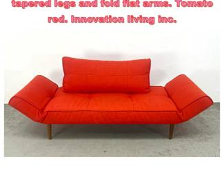 Lot 1744 Danish style settee daybed with tapered legs and fold flat arms. Tomato red. Innovation living inc. 