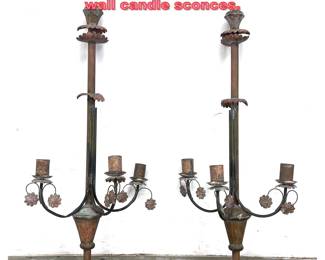 Lot 1295 Pair tall wrought iron threearm wall candle sconces.