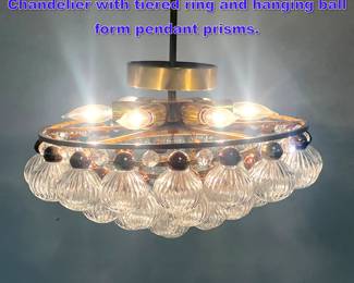 Lot 892 Modernist Brass and Glass Chandelier with tiered ring and hanging ball form pendant prisms.