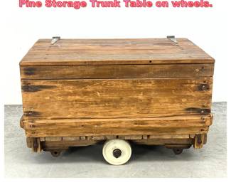Lot 1451 Restoration Hardware Rustic Pine Storage Trunk Table on wheels. 