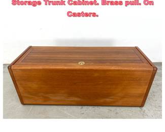 Lot 1251 Mid Century Modern Teak Storage Trunk Cabinet. Brass pull. On Casters. 