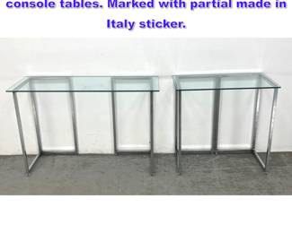 Lot 1058 2pc Italian Chrome and glass console tables. Marked with partial made in Italy sticker.