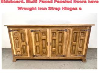 Lot 1575 Rustic Paneled Facade Credenza Sideboard. Multi Paned Paneled Doors have Wrought Iron Strap Hinges a