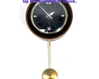 Lot 807 Arthur Umanoff Howard Miller wind Up Pendulum Wall Clock.