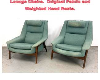 Lot 1224 Pair Folke Ohlsson for Dux Lounge Chairs. Original Fabric and Weighted Head Rests. 