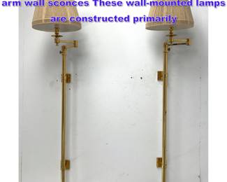 Lot 1086 Pair of Tall Hansen brass swing arm wall sconces These wallmounted lamps are constructed primarily