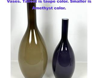 Lot 706 2pc Cased Glass Slender Neck Vases. Tallest is taupe color. Smaller is Amethyst color.